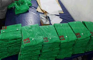wholesale bulk PVC green raincoat for kids manufacturer
